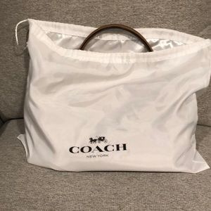 Tan medium size coach purse